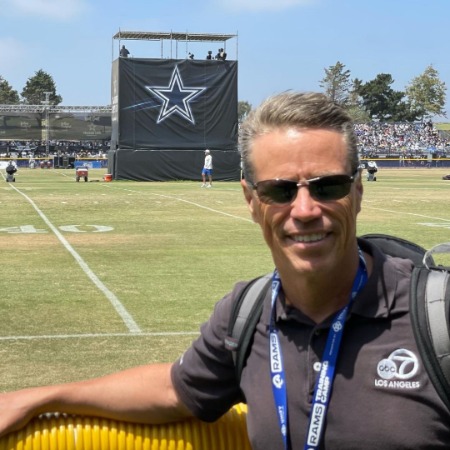 Curt Sandoval is posing for the photo.